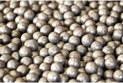 What are grinding balls in mining?