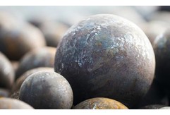 What is the purpose of a grinding ball?